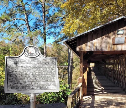 Historic Cabin in a natural setting with waterfalls and covered bridge