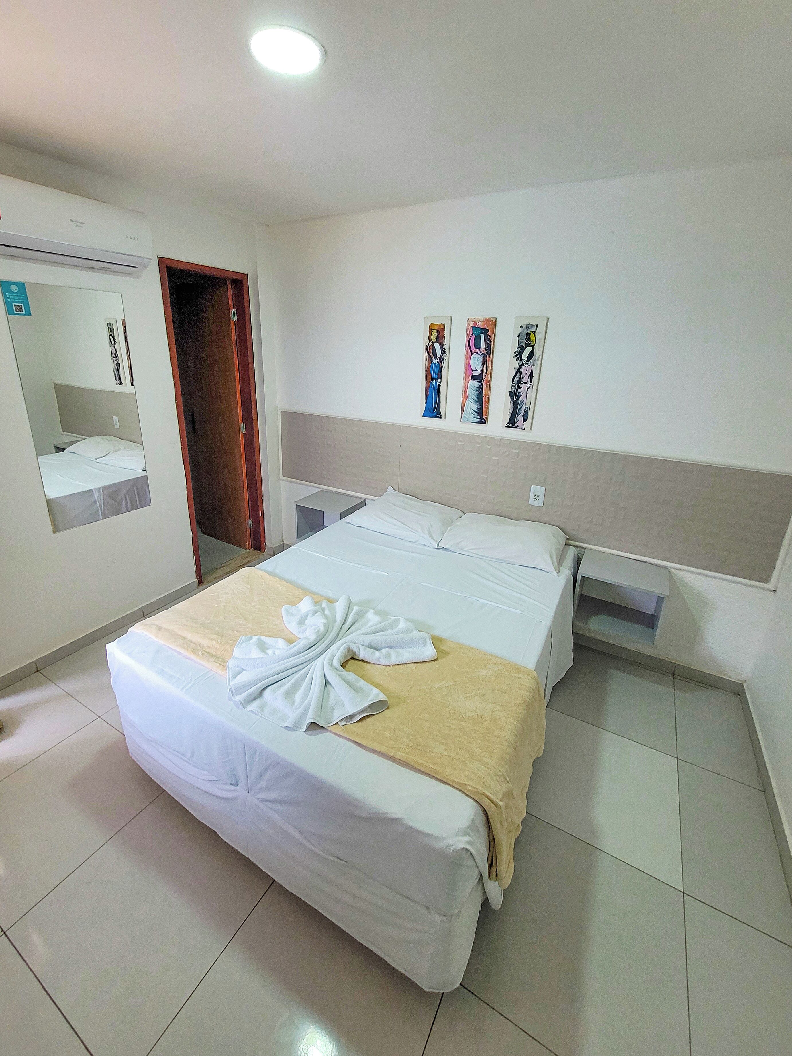 Quarto casal standard | Frigobar, Wi-Fi de cortesia, roupa de cama