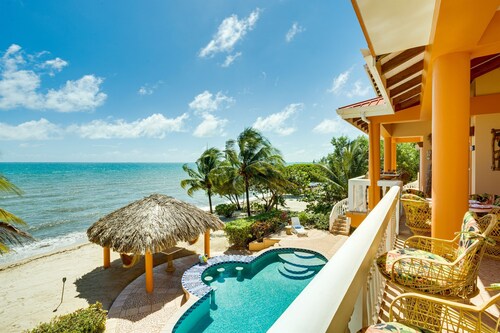 Sun Suite: Cozy Beachfront Studio Rental with Pool