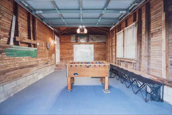 Relax in this inviting space with a foosball table for friendly competition.