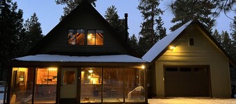 Wooden A-Frame Cabin Nestled in the Tall Pines