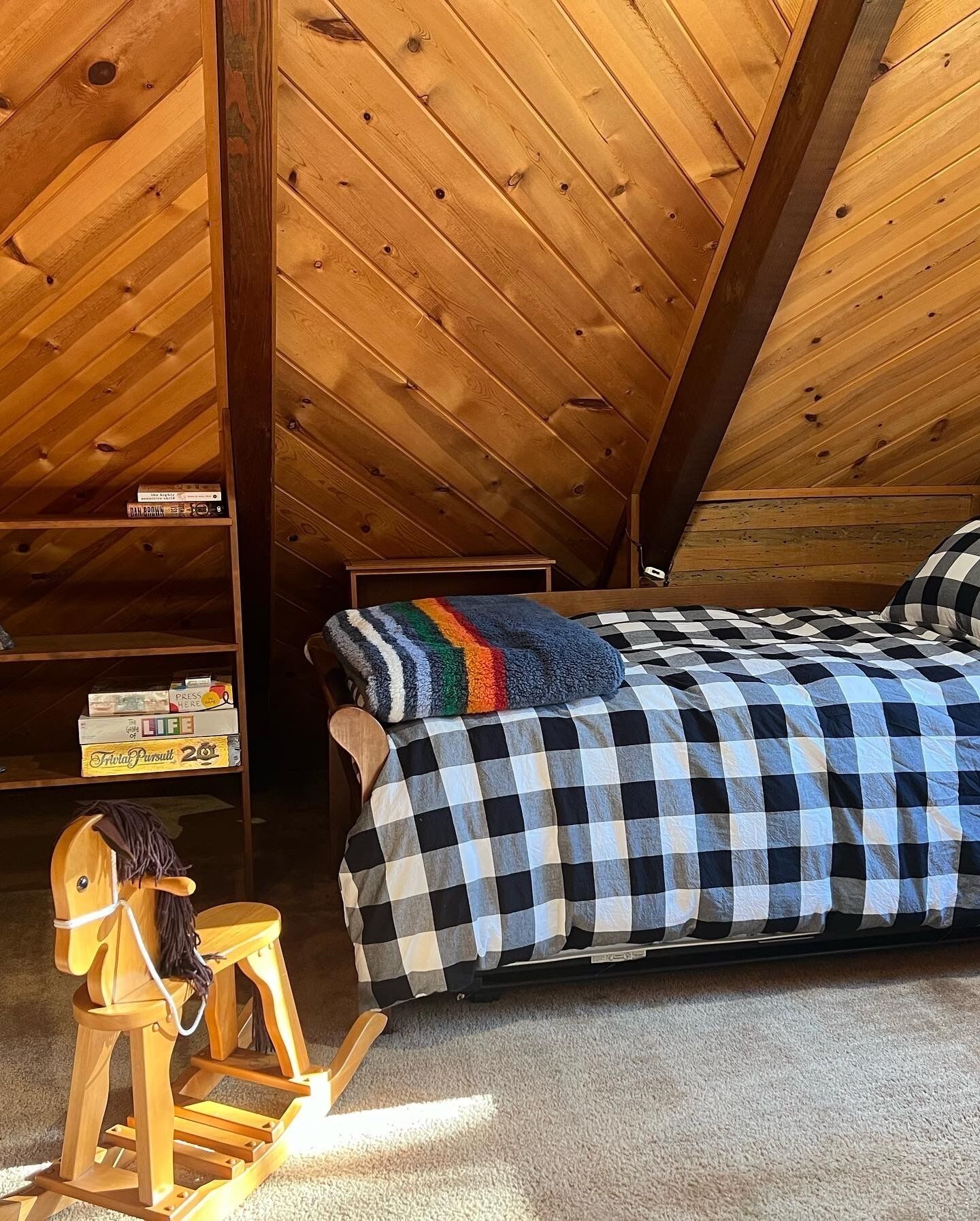 Wooden A-Frame Cabin Nestled in the Tall Pines