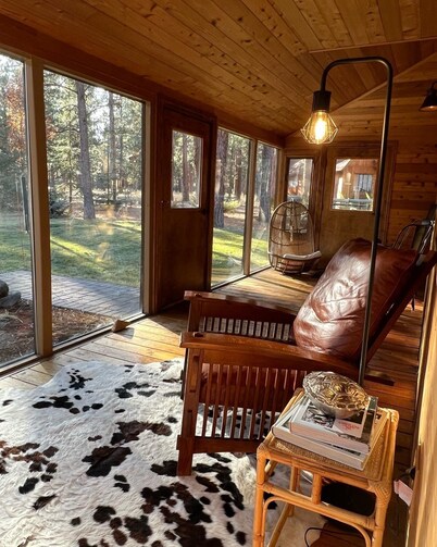 Wooden A-Frame Cabin Nestled in the Tall Pines