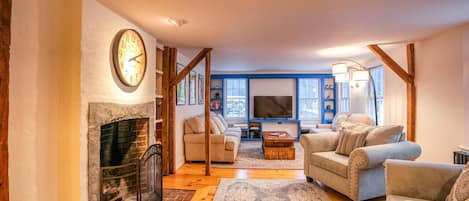 Smart TV, fireplace, books