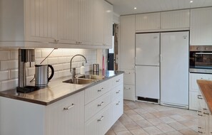 Fridge, microwave, dishwasher, coffee/tea maker