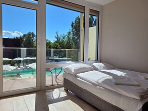 Panoramic Triple Room | Minibar, in-room safe, desk, iron/ironing board - Colors Holiday Hotel (Siófok)