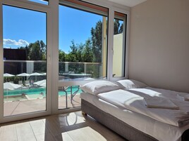 Panoramic Triple Room | Minibar, in-room safe, desk, iron/ironing board