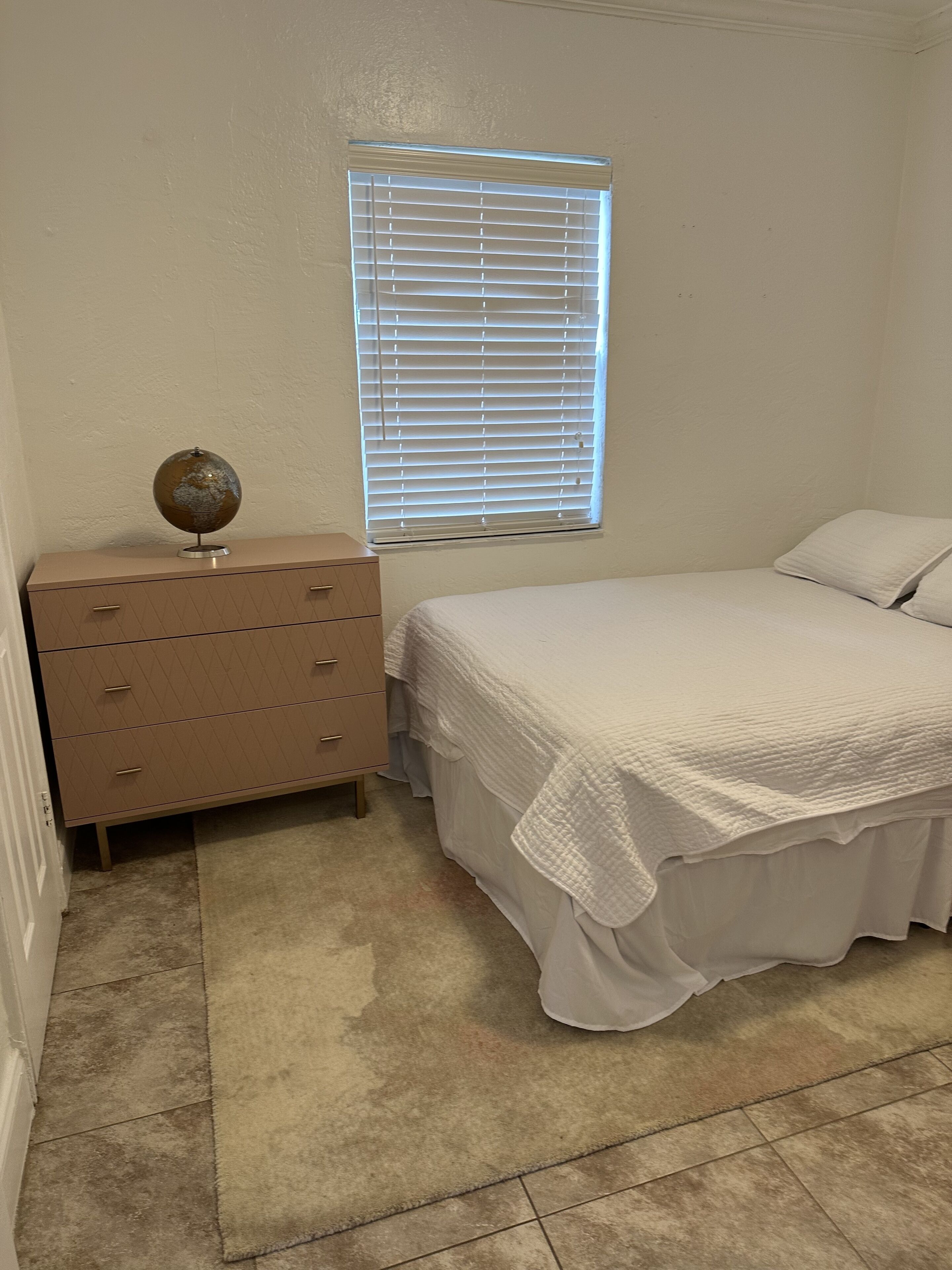 This home has 2 bedrooms and 1 bath with a huge backyard. 