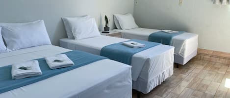 Standard Quadruple Room | Minibar, iron/ironing board, free WiFi, bed sheets