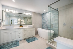 Bathtub, hair dryer, towels
