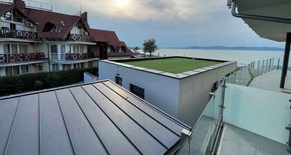 Holiday apartment with private beach, WiFi and air conditioning