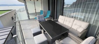 Holiday apartment with private beach, WiFi and air conditioning