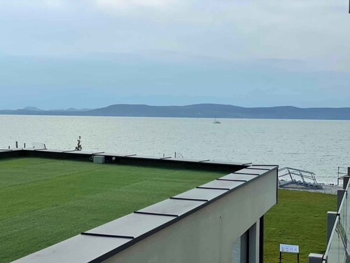 Holiday apartment with private beach, WiFi and air conditioning