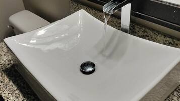 Hair dryer, towels, soap, shampoo