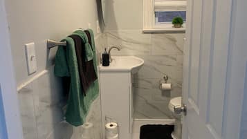 Hair dryer, towels, soap, toilet paper