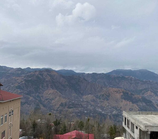 Surrounded by rolling hills and valleys, this serene landscape offers breathtaking views.