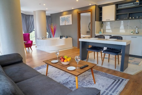 Elite Suite | Premium bedding, down comforters, desk, laptop workspace