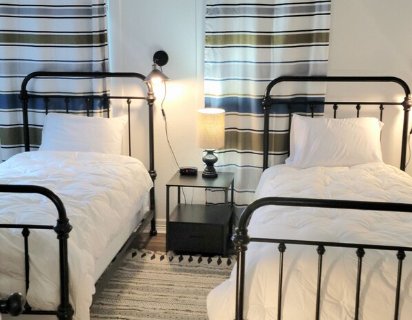 2 bedrooms, desk, iron/ironing board, travel cot