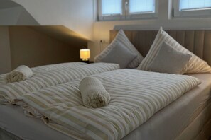 1 غرفة نوم وملاءات أسرّة