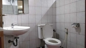 Casa rodante | Baño | Regadera, toallas, shampoo