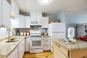 Fridge, microwave, oven, stovetop - Newly-renovated Gulf view condo with pools, hot tub, & beach access (Fort Morgan)