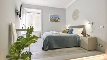 1 camera, una cassaforte in camera, ferro/asse da stiro