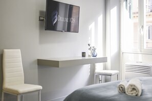 1 chambre, coffres-forts dans les chambres, fer et planche à repasser