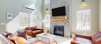 Mountain escape with a hot tub, game room, four bedrooms, & gas fireplace