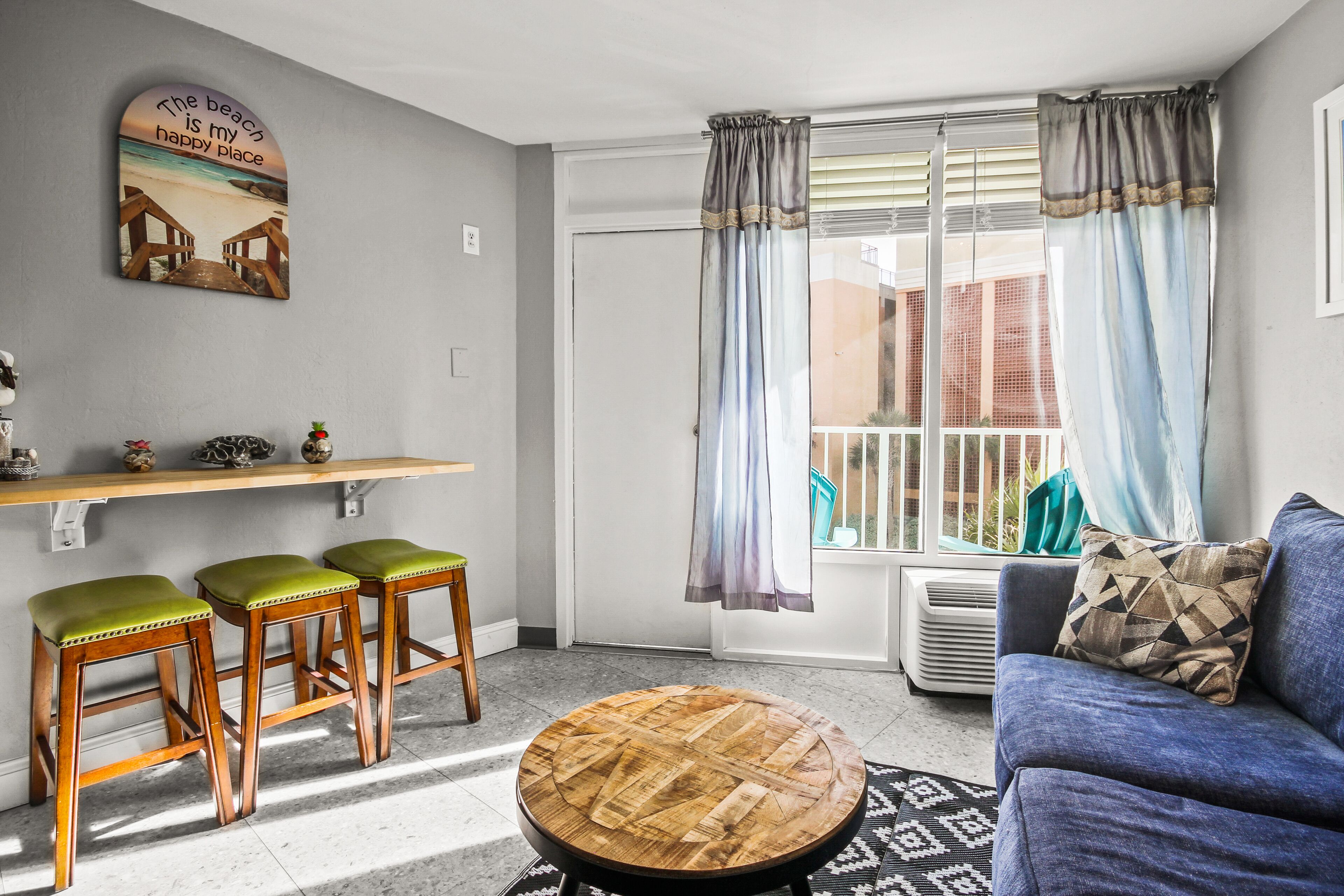 Dog-friendly beachfront studio with partial ocean view, private balcony, & pool