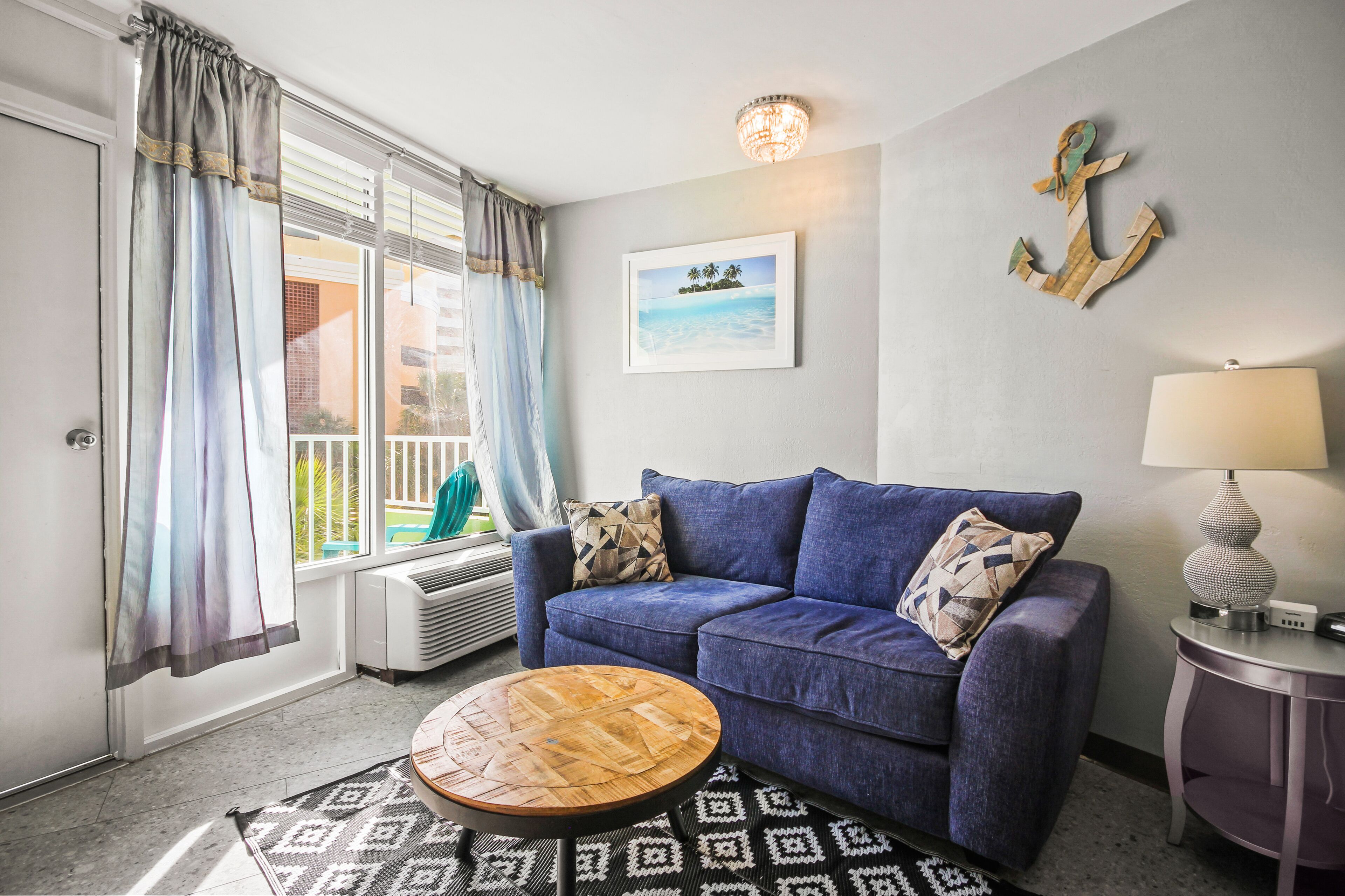 Dog-friendly beachfront studio with partial ocean view, private balcony, & pool