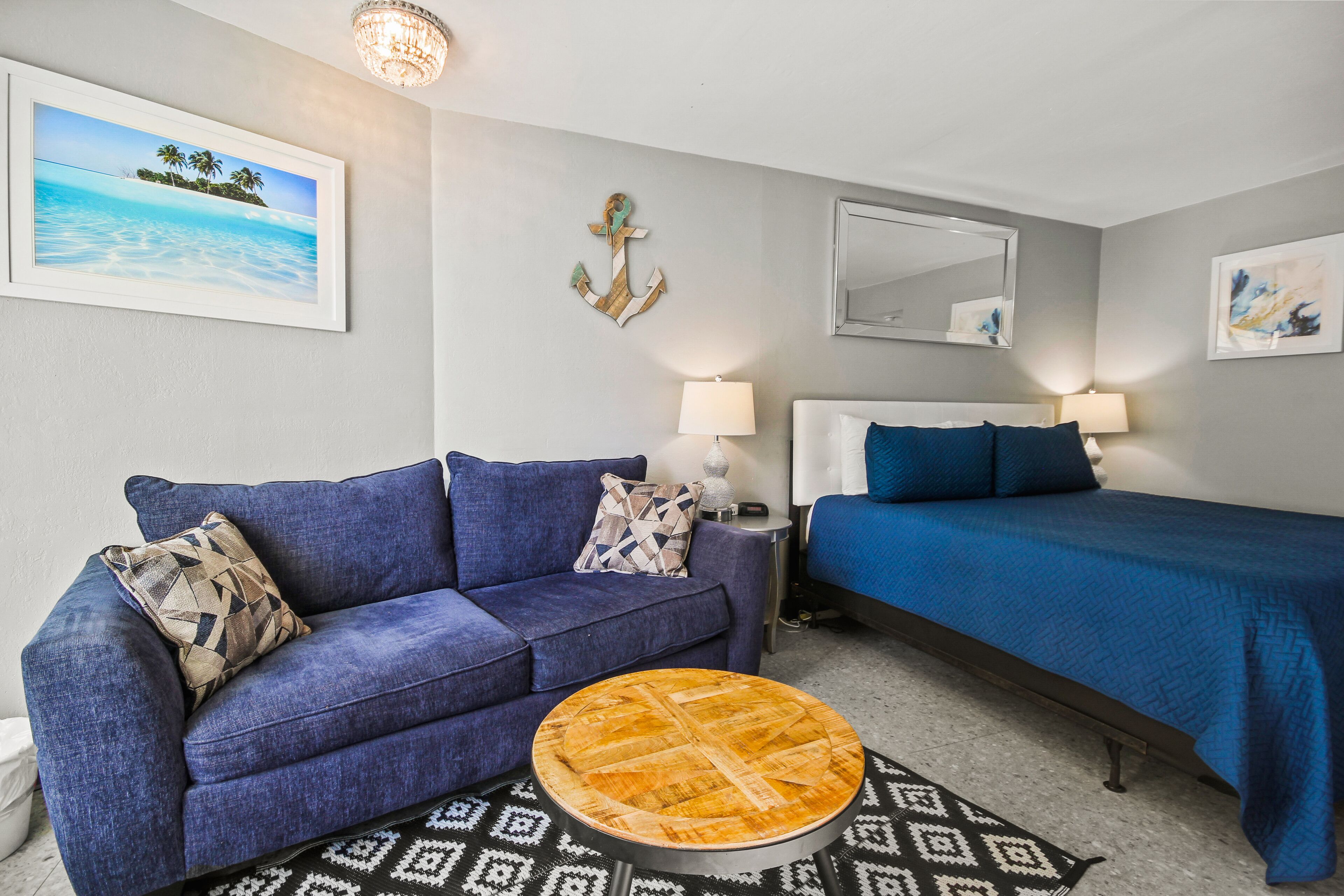 Dog-friendly beachfront studio with partial ocean view, private balcony, & pool