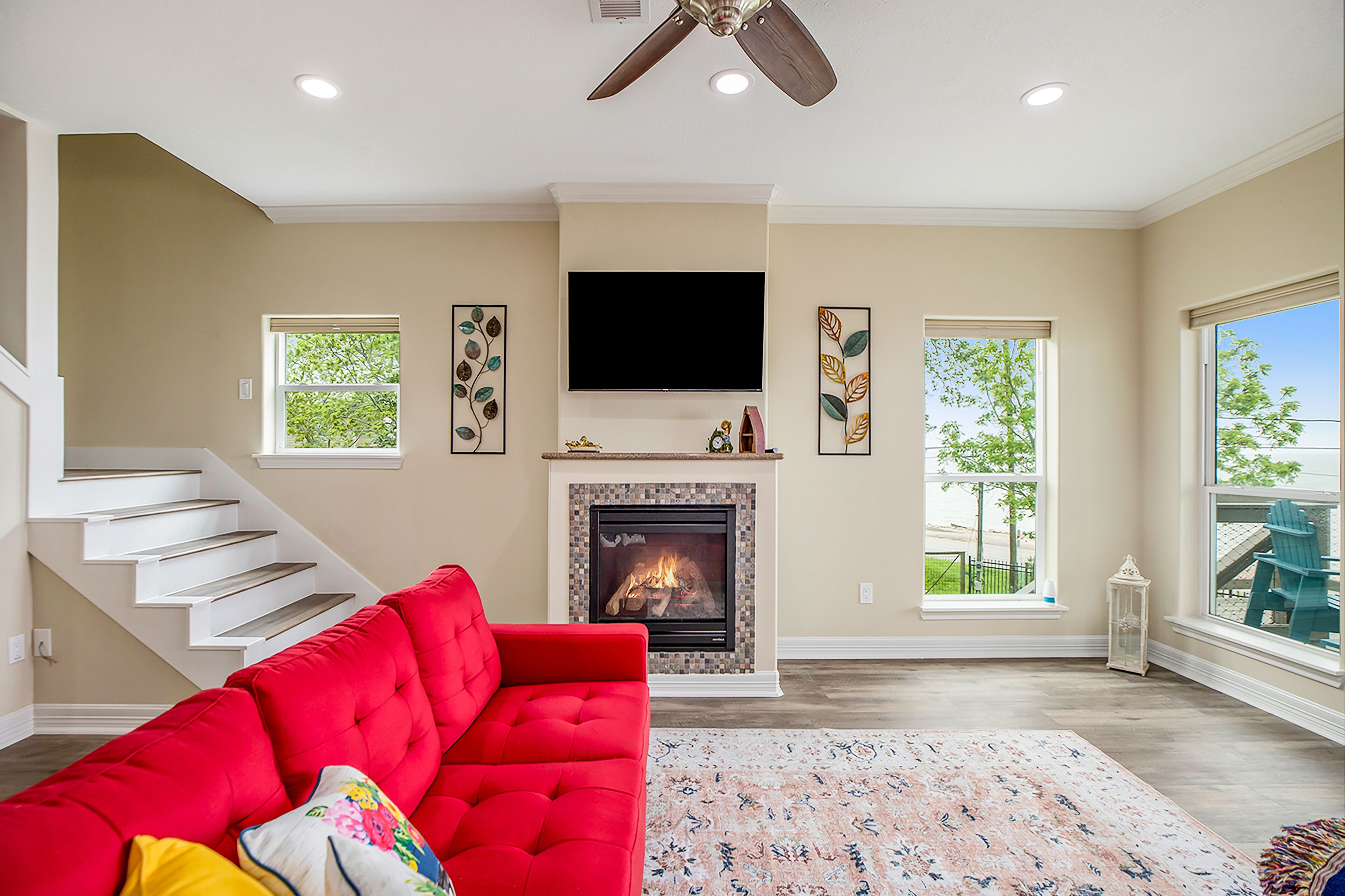 Amazing dog-friendly water view home with patio, fireplace, full kitchen, & TV