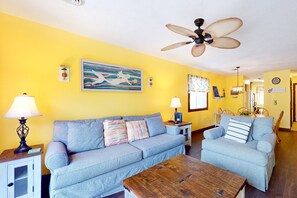 TV, books - Getaway by the sea with pools, hot tub, & grilling area - scenic balcony and AC (Myrtle Beach)