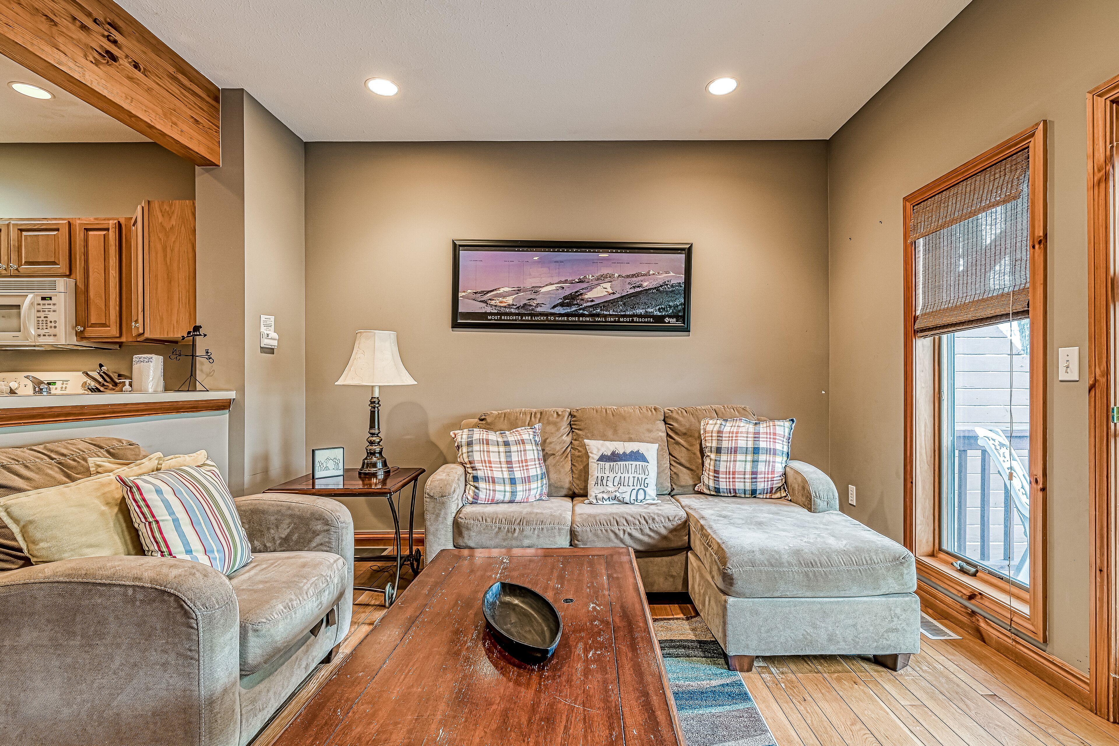 Spacious townhome with balconies, hot tub, pool table, & fireplace