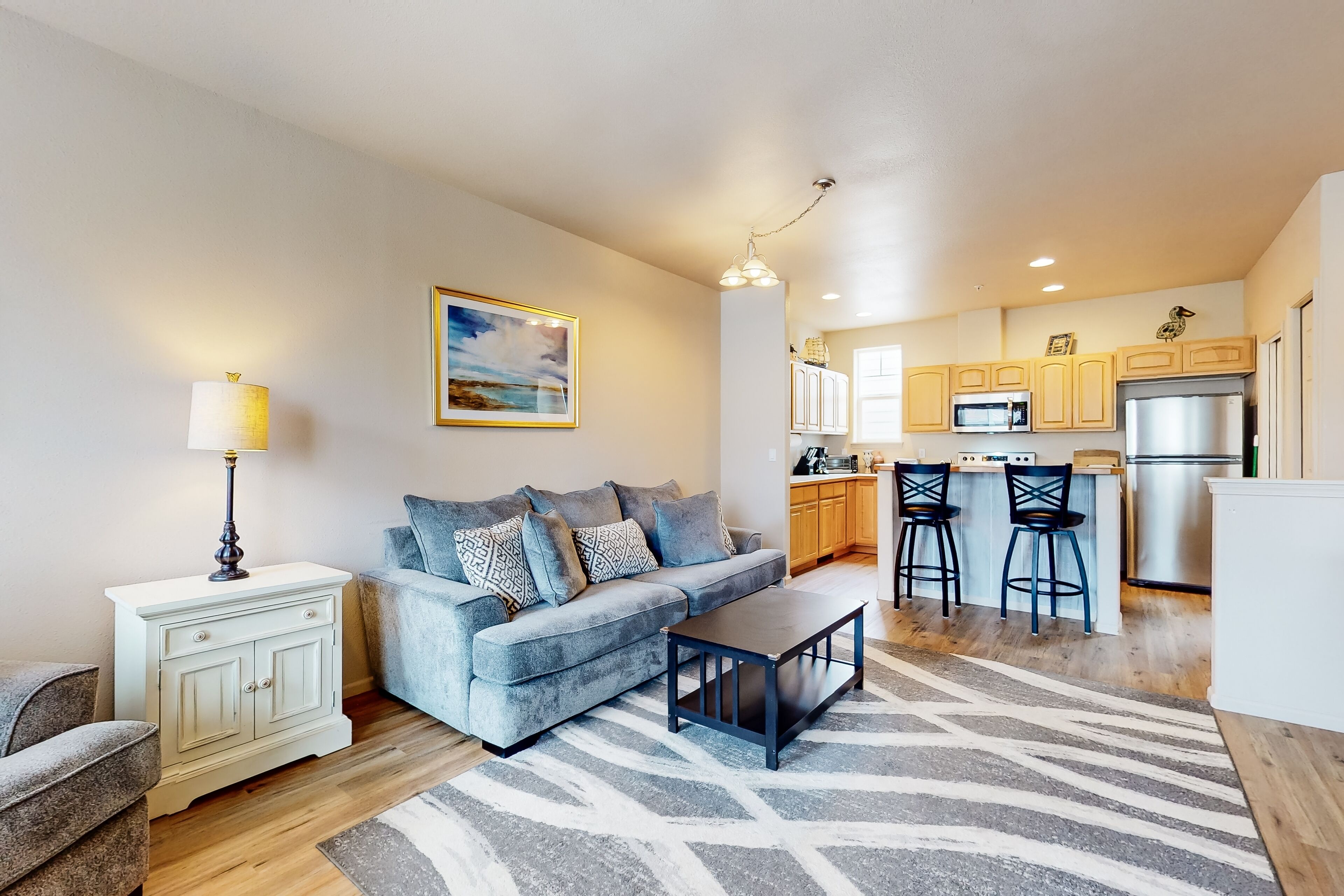 Dog-friendly condo with river views, private W/D, full kitchen, & great location