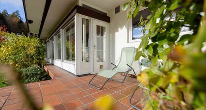 Luxury apartment with terrace and garden free parking smart TV etc