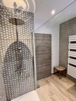 Shower, hair dryer, soap, shampoo
