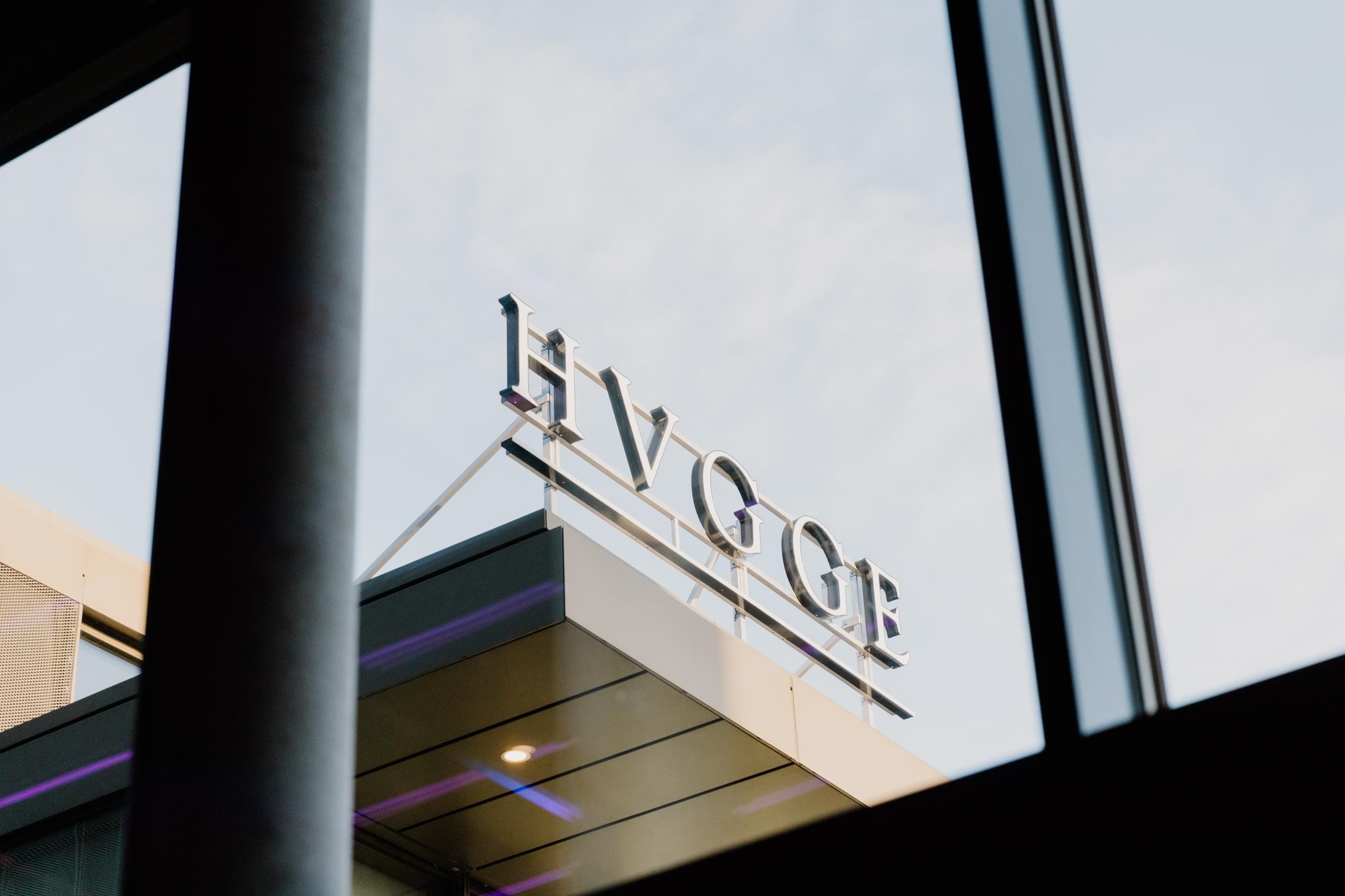 A building with a sign that reads 'LVGGE'.