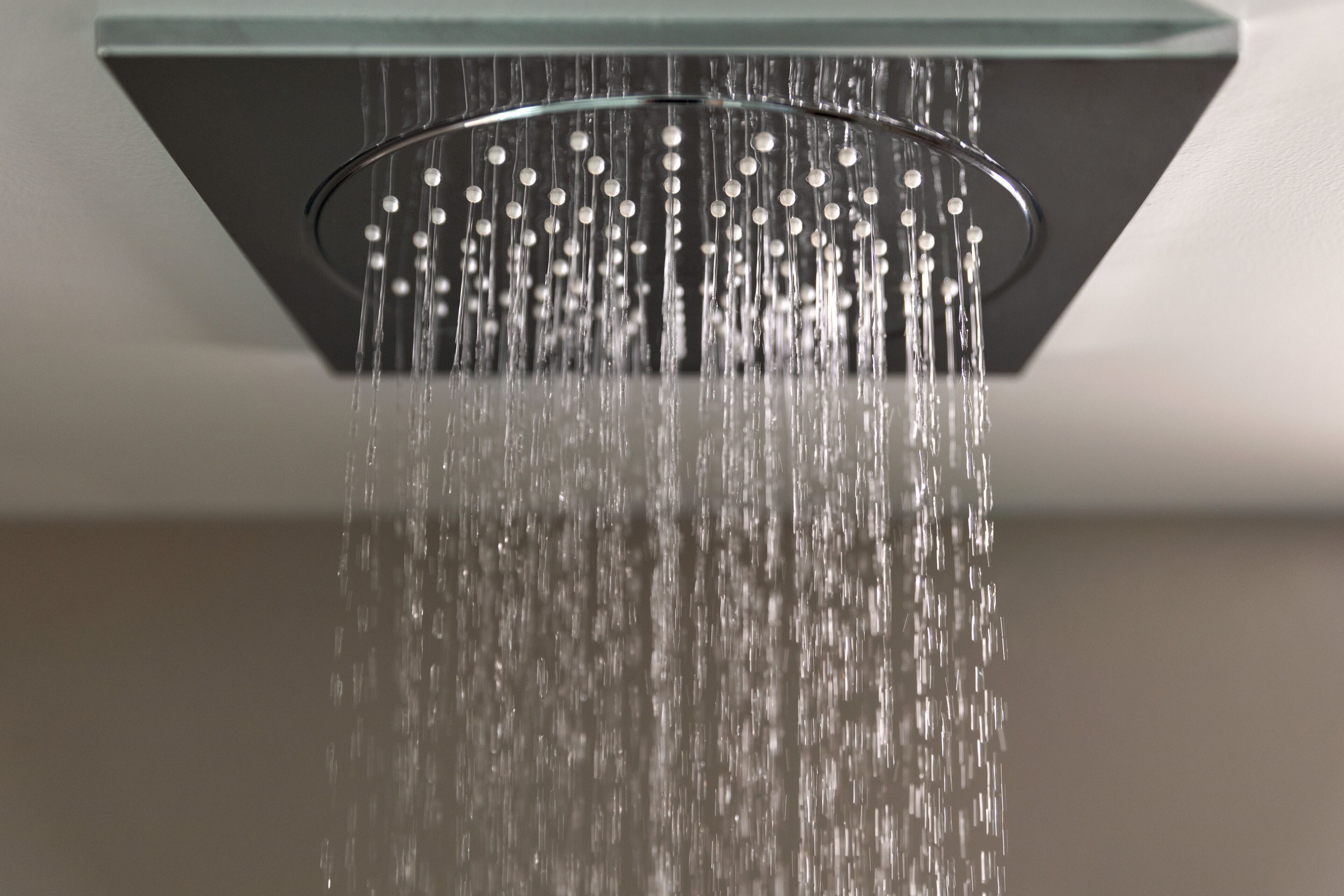 A showerhead with multiple nozzles.