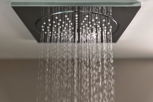 A showerhead with multiple nozzles.