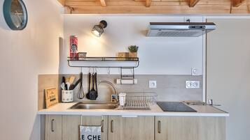 Fridge, microwave, stovetop, coffee/tea maker