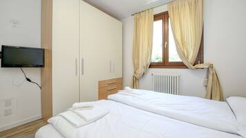 1 chambre, fer et planche Ă repasser, Wi-Fi gratuit, draps fournis