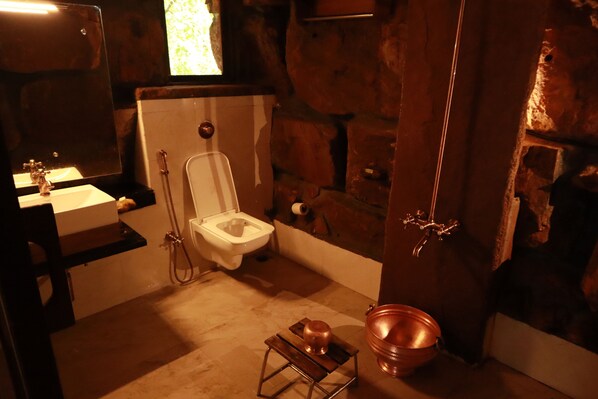 A bathroom with a toilet, sink, and bathtub. - Shatavari Eco Resort (Khanapur)