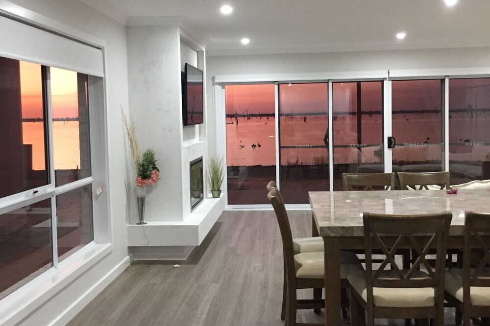 Stunning waterfront home situated amid the Black Bull Golf Course & Sebel Resort