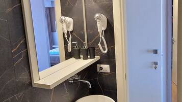 Shower, hair dryer, bathrobes, bidet