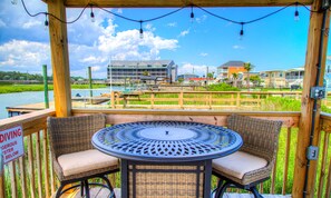 Outdoor dining - Channel-Front Home with Private Pool and Hot Tub (Garden City Beach)