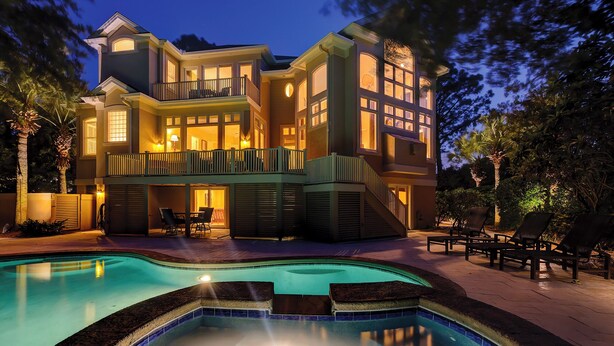 A large, multi-story house with a swimming pool in the foreground. - 12 Port Tack -  4 min walk to the ocean.  Views of golf, lagoons & sunset (Hilton Head Island)