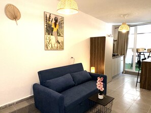 City Apartment, 1 Bedroom, Balcony | Living area | 42-inch flat-screen TV with digital channels, TV, Netflix - AspenTLV - Hacarmel Market Apartments (Tel Aviv)