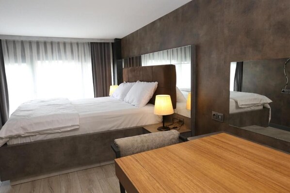 Chambres insonorisées, fer et planche à repasser, Wi-Fi gratuit