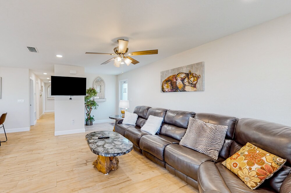 Inviting home with beach access, full kitchen, central AC, & W/D